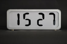 Magnetic fluid clock.